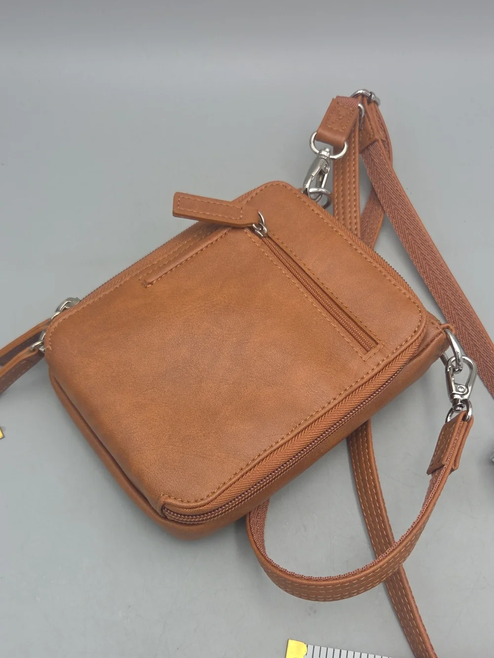 Hammacher Schlemmer • Wearable crossbody leather wallet